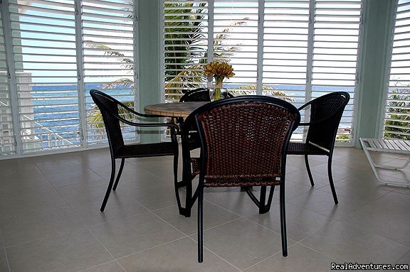 Oceanfront Lanai | Cayman Breeze Luxury Beachfront Condo at Rum Point | Image #7/20 | 