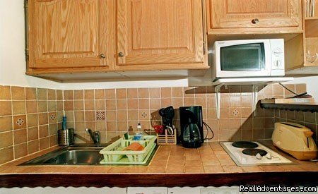 Kitchen area for light cooking, also clothes washer