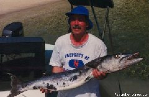 Bill Clinton with a 54 barracuda | Three Points Villa | Image #2/4 | 