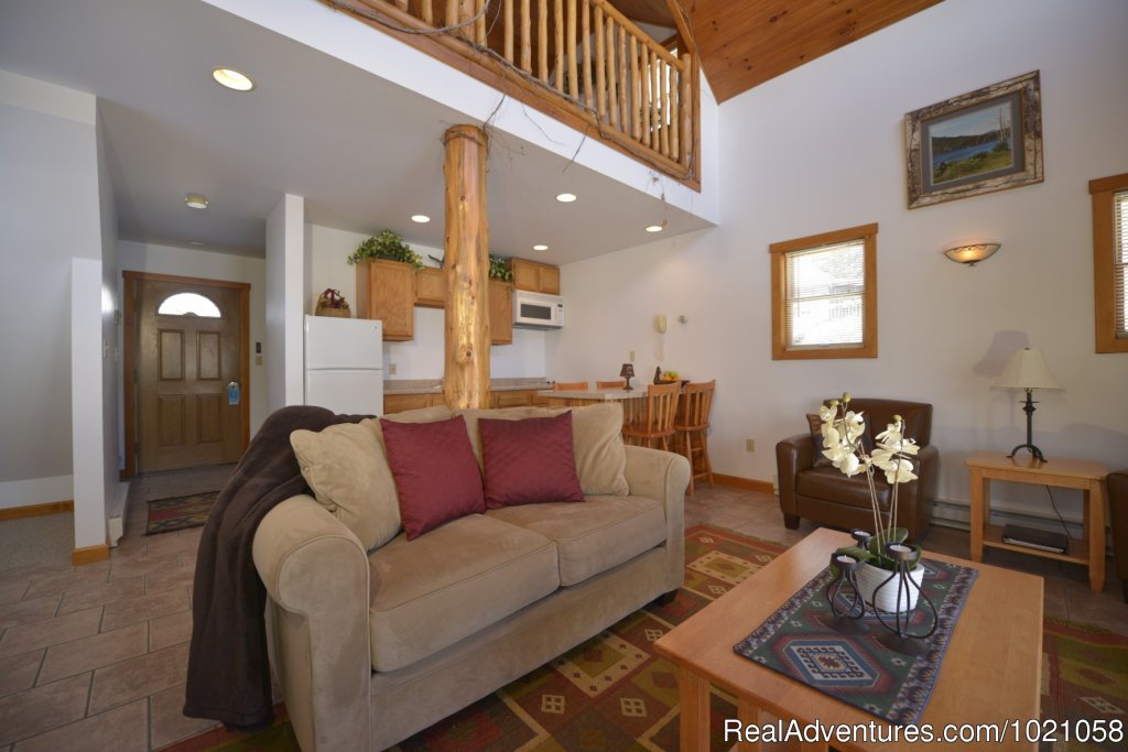 Living room to Kitchen | Placid Bay Inn On Lake Placid Vacation Getaways | Image #11/24 | 