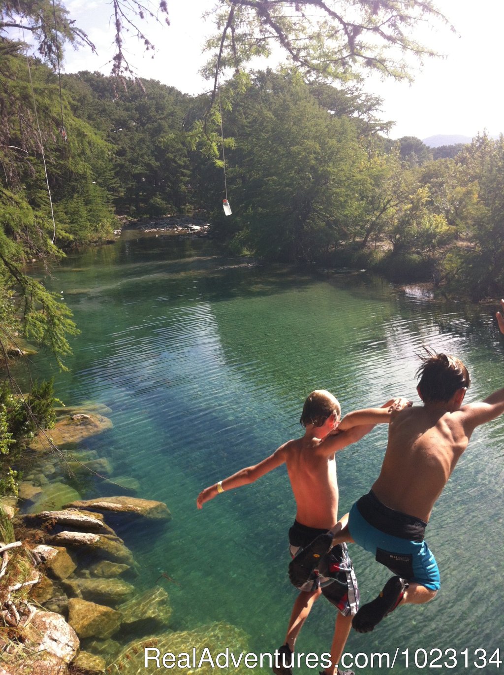 Bluff jumping at the River Terrace Property | Secluded Cabin in Texas Hill Country on Frio River | Image #4/12 | 