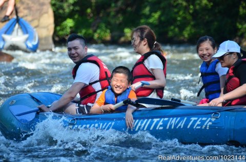 Kids Enjoying their Rafting Trip