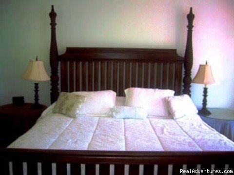 King-size bed | Queen's Gardens Resort | Saba, Saba | Hotels & Resorts | Image #1/3 | 