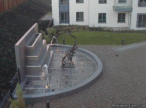 Water feature in Courtyard | Falcon Apartment Jacobs Island Cork City | Image #4/5 | 