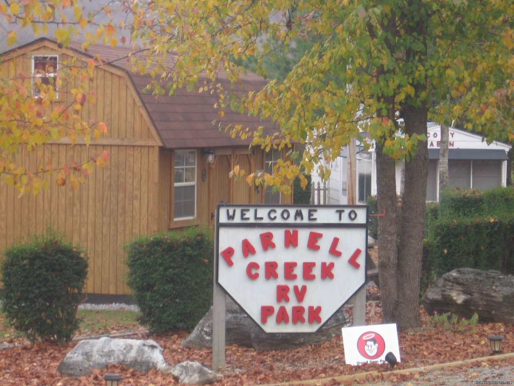 Entrance sign and Cowboy Bunkhouse Cabin | Parnell Creek RV Park | Image #10/11 | 