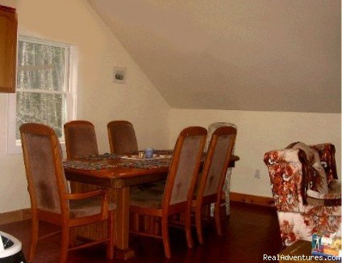 Dining Area (Large Oak Table: Seats 6) | Matinicus Island Oceanfront Getaway Cottage | Image #3/10 | 