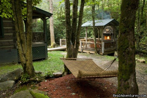 Creekside deck with fireplace and hot tub (Waters Edge)