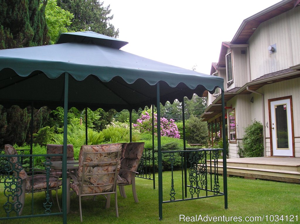 Enjoy a BBQ or picnic in the garden gazebo. | Cedar Wood Lodge Bed & Breakfast Inn | Image #20/26 | 