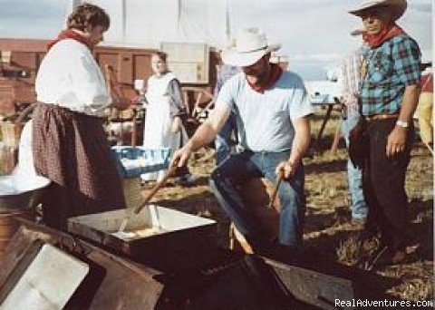 Meal being prepared over firepit