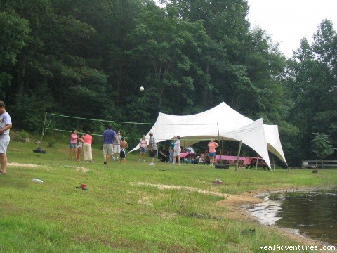 Family Reunion Volleyball Game on the lake front.