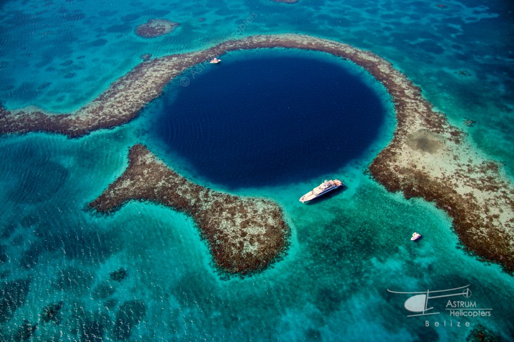 The Great Blue Hole & Bell 407 | Blue Hole & Turneffe Islands: Helicopter Tour | Belize City, Belize | Scenic Flights | Image #1/9 | 