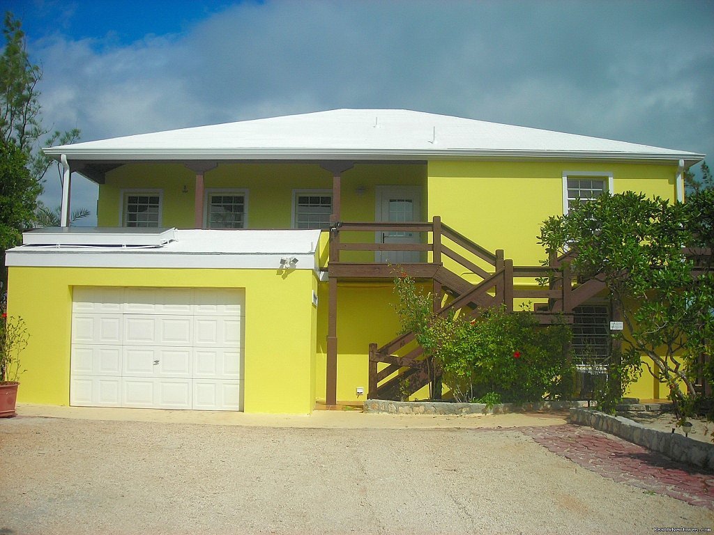 View of Villa from Tropical Gardens | Oceanfront Villa on Grace Bay Beach | Image #4/24 | 