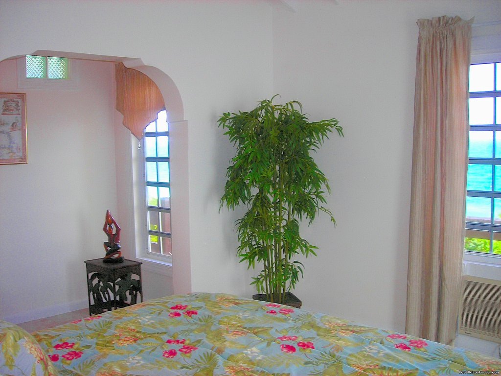 Master Bedroom with King Bed Faces the Ocean-2nd Floor | Oceanfront Villa on Grace Bay Beach | Image #14/24 | 