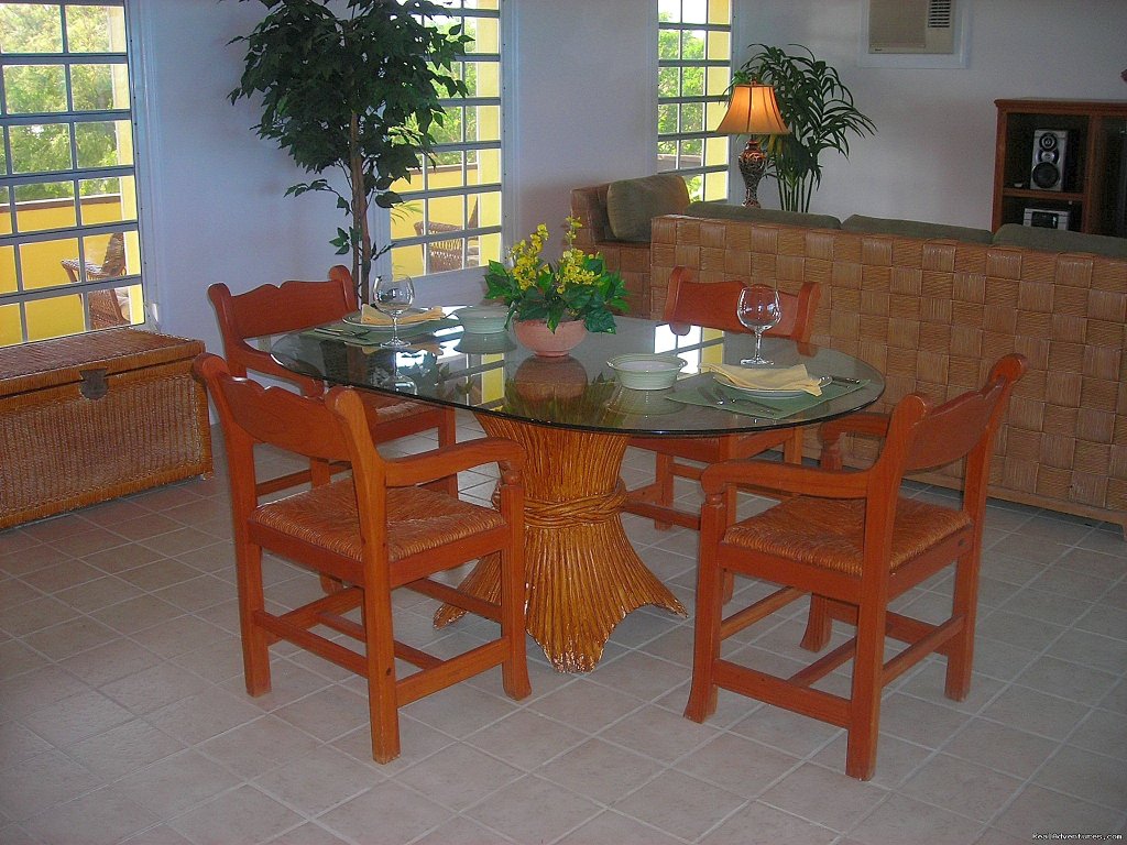 Open Concept Dining & Living Area Facing the Ocean-2nd Floor | Oceanfront Villa on Grace Bay Beach | Image #15/24 | 