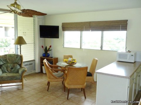 Dining area with windows to the sea. Great breezes!