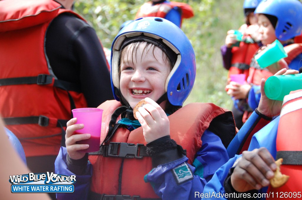 A wee river rat enjoying a cookie after the Smoky River | Alberta's Best Rafting at Wild Blue Yonder | Image #7/11 | 