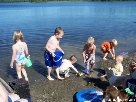 Enjoying our sandy beach | Spacious Lakefront Cabins on Moosehead Lake Maine | Image #5/6 | 