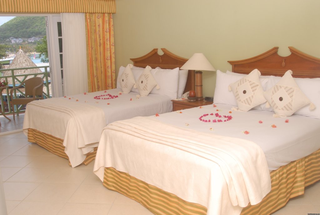 Deluxe Bedroom | Bay Gardens Beach Resort & Spa - Family Fun | Image #12/15 | 