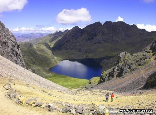 Blue lagoon along the trek to Lares Valley | Sun Gate Tours | Image #6/6 | 