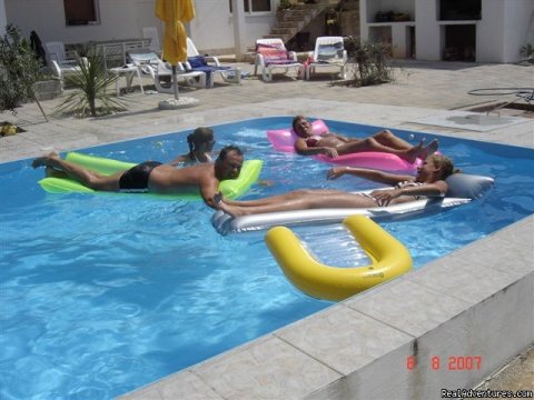 Family In Pool