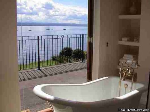 The bathroom in Bedroom 1 and French doors to terrace.