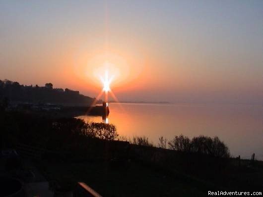 Sunset from Bedroom 1 terrace. | 5 star Water's Edge Bed and Breakfast in Scotland | Image #4/8 | 