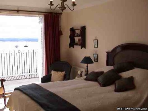 Bedroom 2 & French door to the terrace.