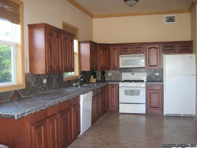 Cottage Kitchen | Exuma Blue-Ocean View  from Jaccuzi Tub in Bedroom | Image #4/20 | 