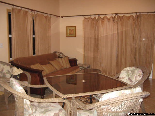 Cottage Living Room | Exuma Blue-Ocean View  from Jaccuzi Tub in Bedroom | Image #5/20 | 