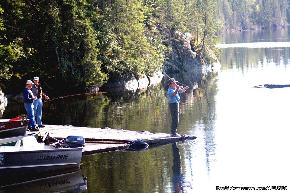 Fly casting off the dock | Slippery Winds Wilderness Lodge, Yoke Lake Nw Ont. | Image #14/14 | 