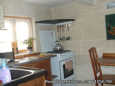 Communal main kitchen area | Budget Getaway  at Sliema Homestay Malta | Image #4/9 | 