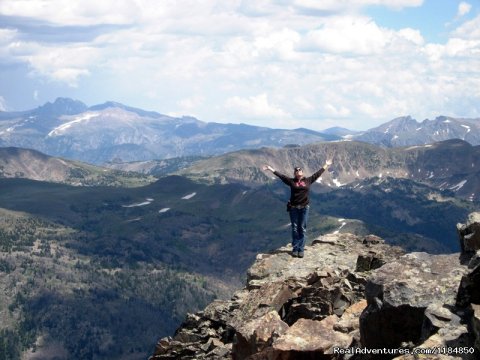 Hiker on the top of Monument Peak