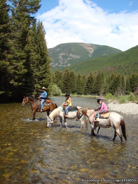 Riding across the Boulder River