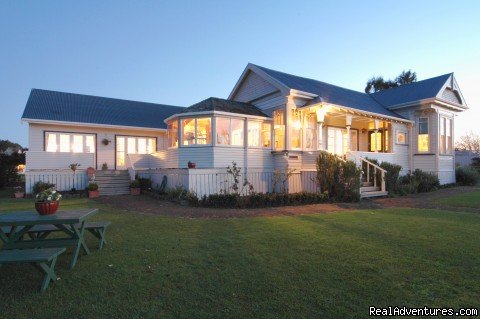 Cotswold Cottage Country House at dusk | Cotswold Cottage relax and unwind | thames, New Zealand | Bed & Breakfasts | Image #1/1 | 