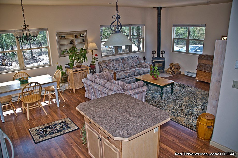 Fairy House living room with wood stove | Enchanted Forest Accommodations Crestone CO | Image #13/19 | 