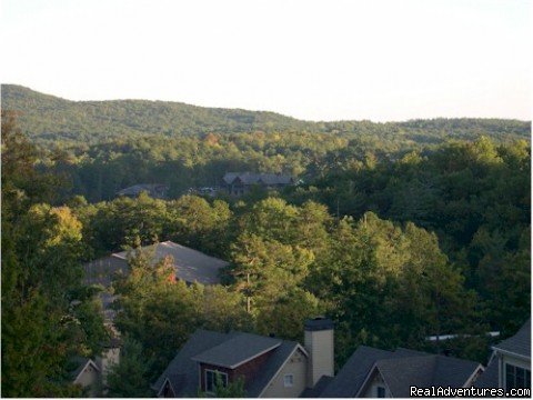 View from Deck shows New Club House on the Horizon | Bear's Den Luxury Home Rental in Big Canoe | Image #9/13 | 