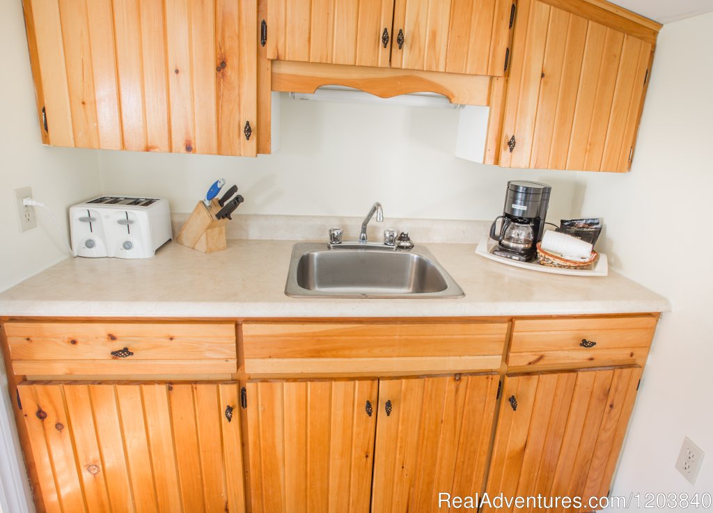 Cozy Cabin Kitchen | Canada's Best Value Inn & Suites | Image #17/26 | 