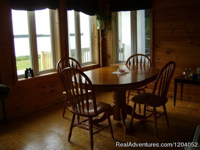 Table facing beach | Sparkling Sunset Cottage | Image #6/11 | 