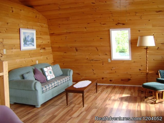 Upstairs sitting area facing the beach | Sparkling Sunset Cottage | Image #9/11 | 