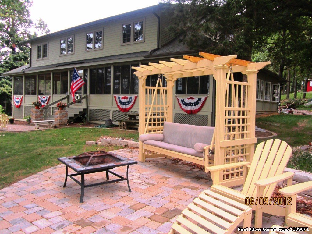 Lake Ripley Lodge B And B Lake Front Fire Pit | Lakefront Escape  At Lake Ripley Lodge Grand Porch | Image #8/8 | 