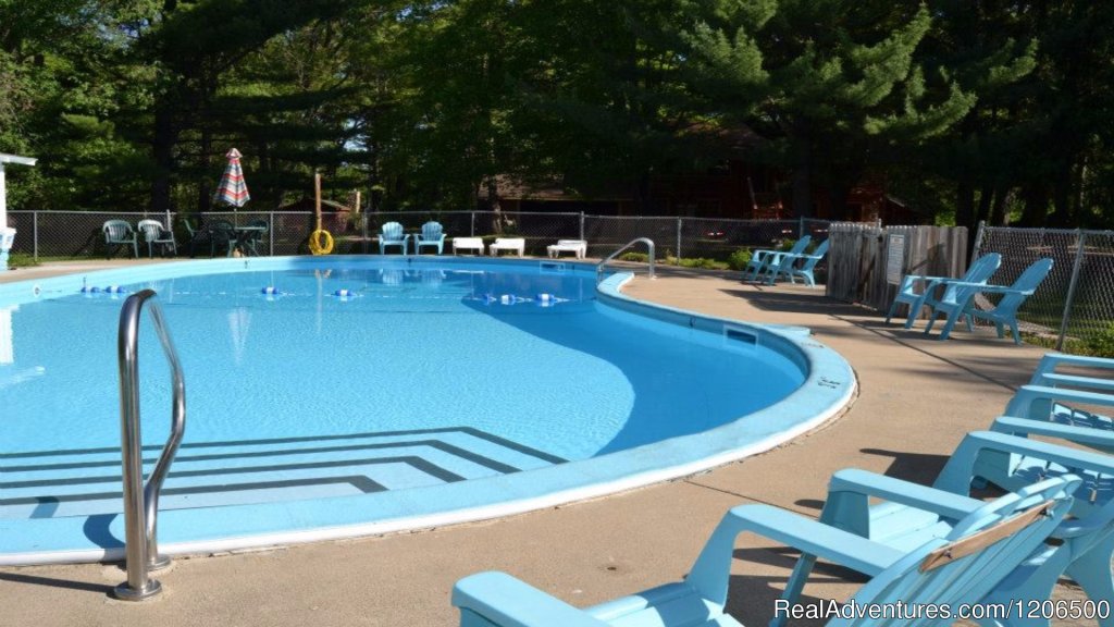 Outdoor Pool | Wooded Log Cabins at Birchcliff Resort | Image #2/8 | 