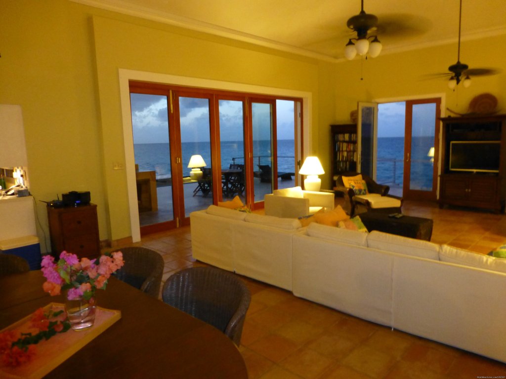 Living Room with views the ocean with doors out to the deck | SeaViewPlay  New Pool & Fabulous Ocean Front Villa | Image #11/26 | 