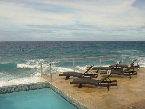 Relax on a lounge and read or dip in the pool