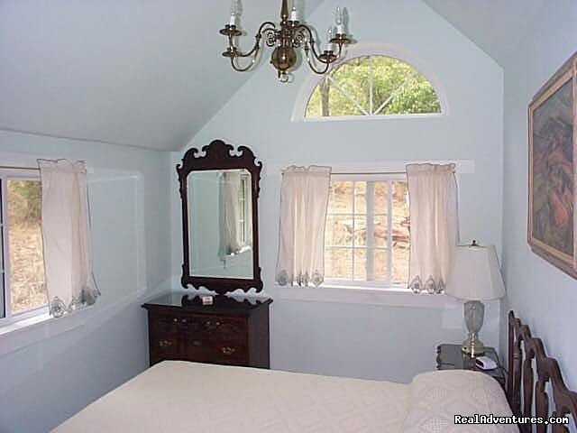 A bedroom in Cabin 17 | Stone Mountain Lodge and Cabins | Image #4/5 | 