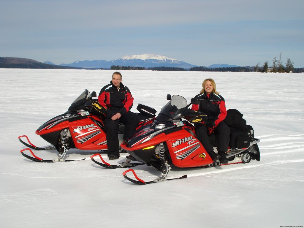 Guests on the lake in front of the Lodge. | A Unique Waterfront B & B in the Heart of Maine | Image #16/18 | 