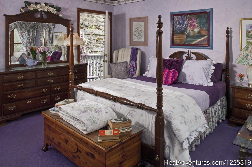 Colette's bedroom opens onto private balcony | Cliff Cottage B&B Luxury Suites/Historic Cottages | Image #14/23 | 