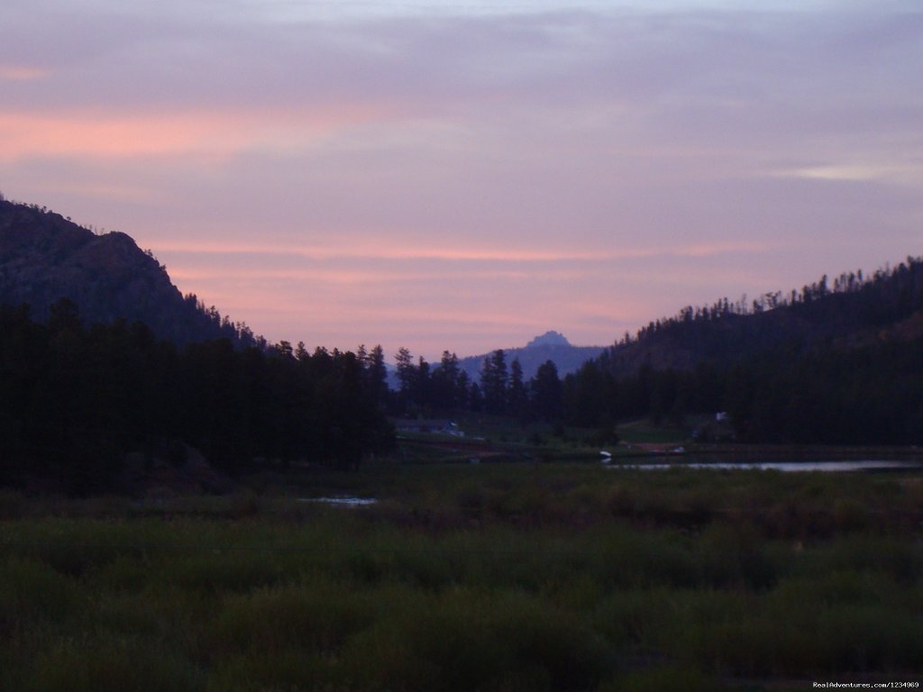 Enjoy beautiful sunsets right from the deck. | Pikes Peak Retreat In Pikes National Forest | Image #22/26 | 