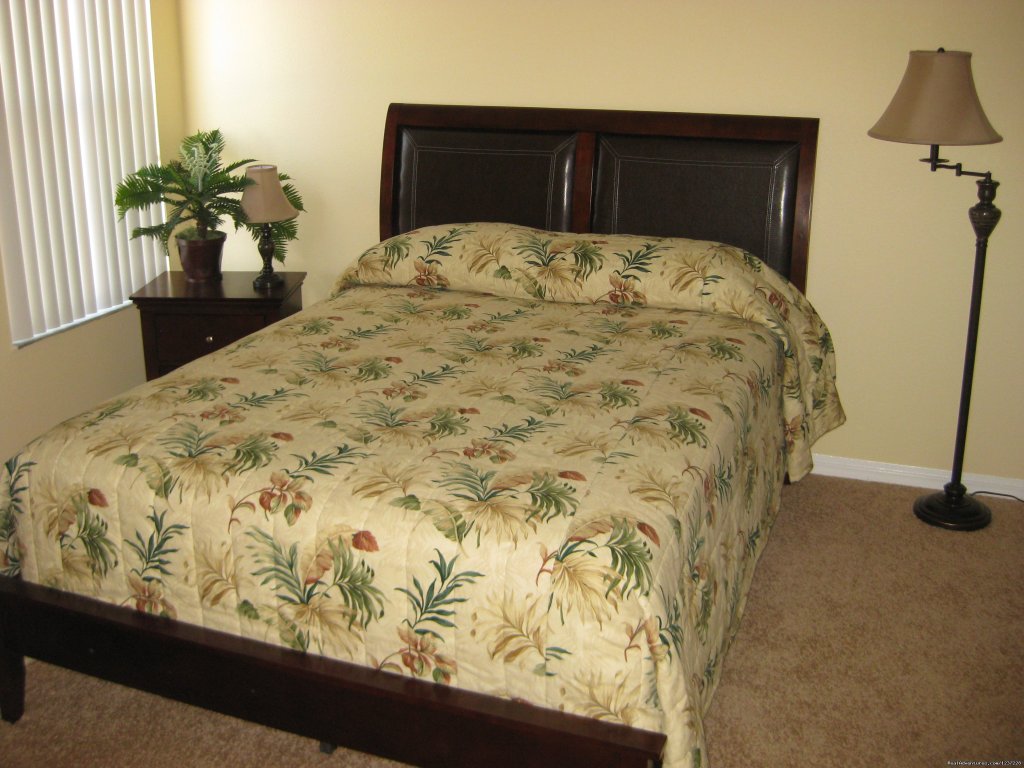 Queen Bedroom | Jungle Retreat, pool home near Disney, wifi & more | Image #3/17 | 