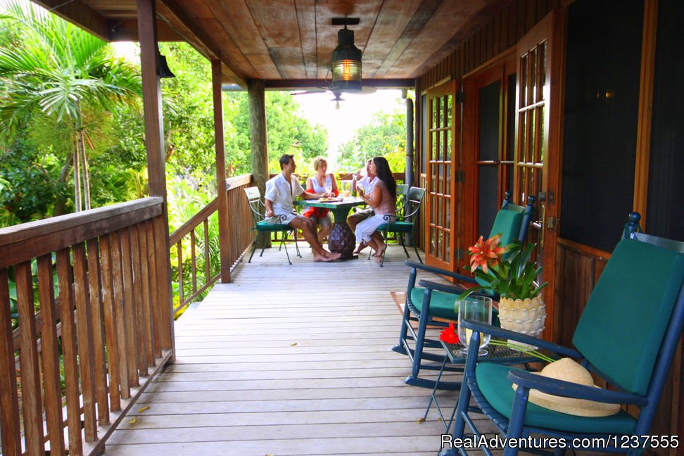 Expansive porches and decks offer a welcome retreat. | Seabird Key, Private Island,  Sandy beach & boat | Image #6/24 | 