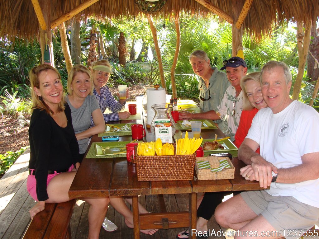 Toss formality aside and dine under the chickee hut. | Seabird Key, Private Island,  Sandy beach & boat | Image #21/24 | 